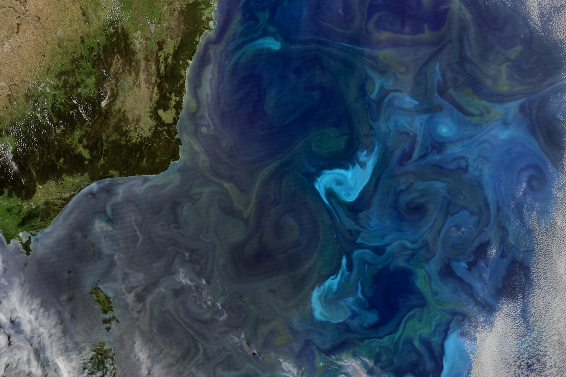 Swirling blue ocean currents seen from above
